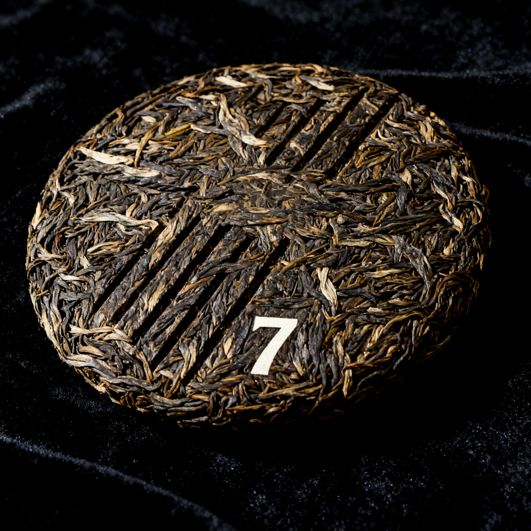 aged Zhongcha ripe Pu-erh tea cake front view