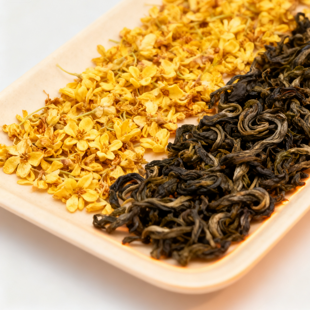 Premium dried osmanthus flowers and loose leaf green tea on a ceramic plate, high quality Chinese tea ingredients for herbal infusion and traditional brewing