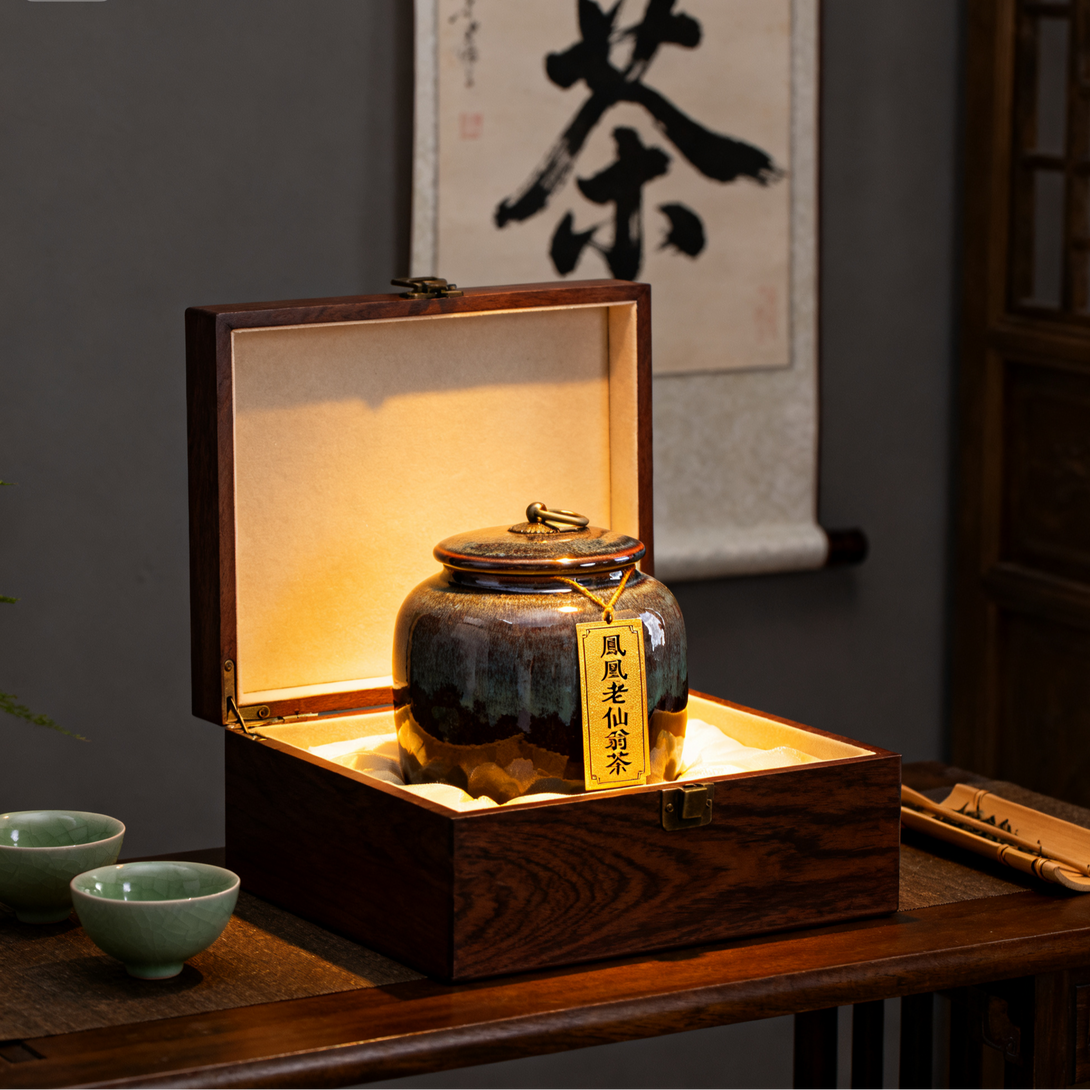 Tea canister in a wooden box with green tea cups on a wooden table, in a traditional setting