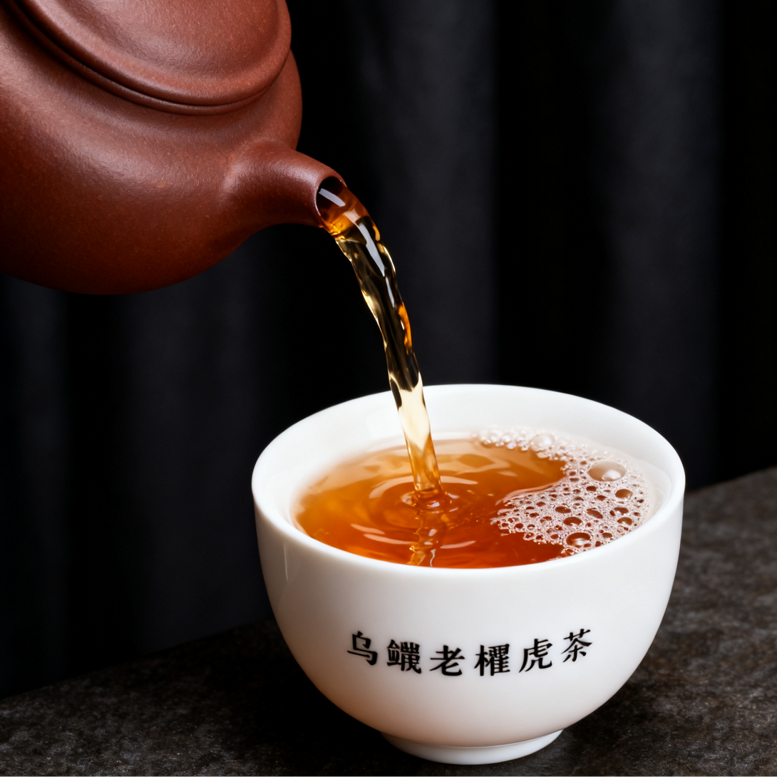 Tea being poured from a teapot into a white cup with black text on a dark background